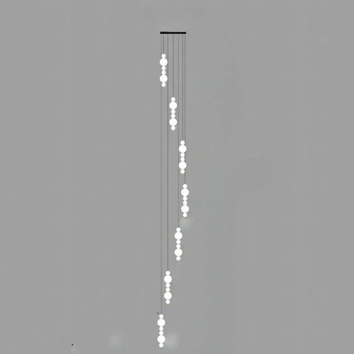 Suspension luminaire oxyo avec boules opalines blanches et structure métallique noire minimaliste chute verticale