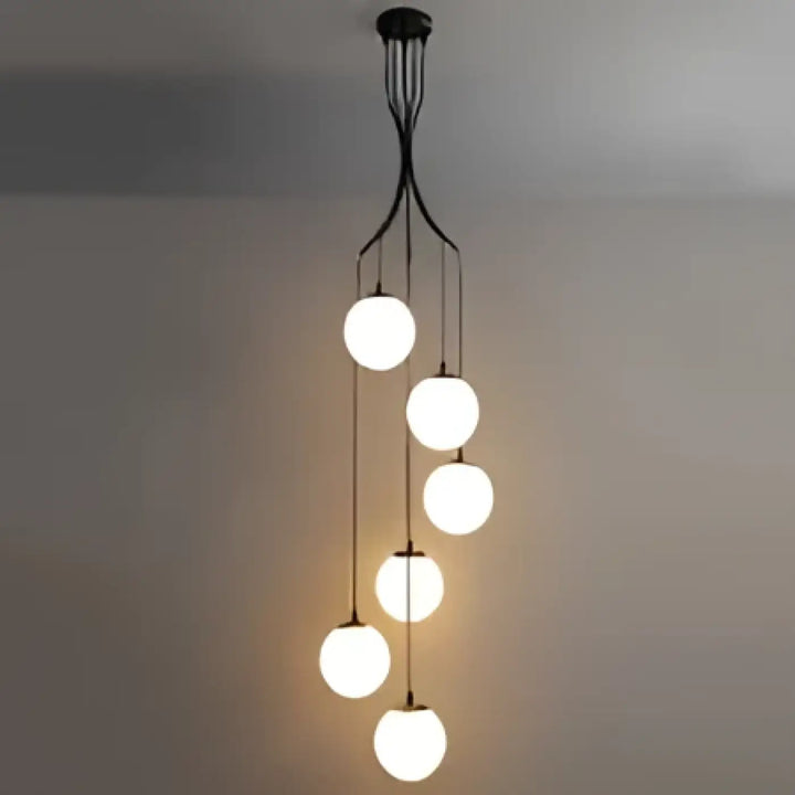 Suspension luminaire umami moderne avec neuf ampoules sphériques en verre suspendues à une structure métallique noire