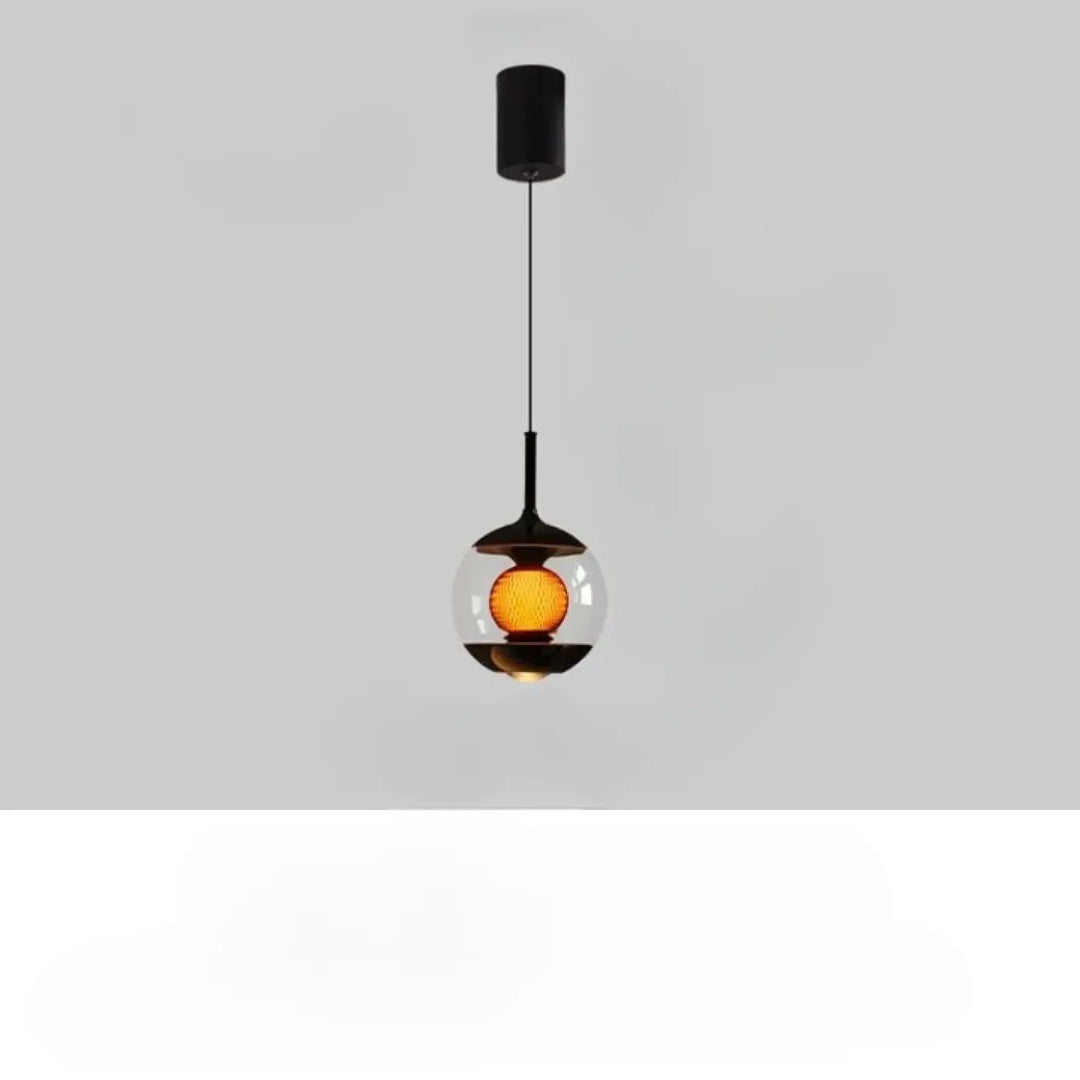 Suspension luminaire nexus avec globe en verre noir et ampoule texturée ambre pour luminosité variable élégante