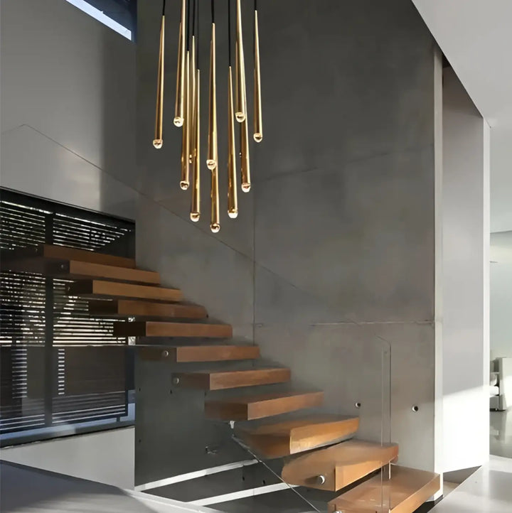 Suspension luminaire gildeo avec éclairage cylindrique doré h300cm lumière chaude et lumière neutre moderne