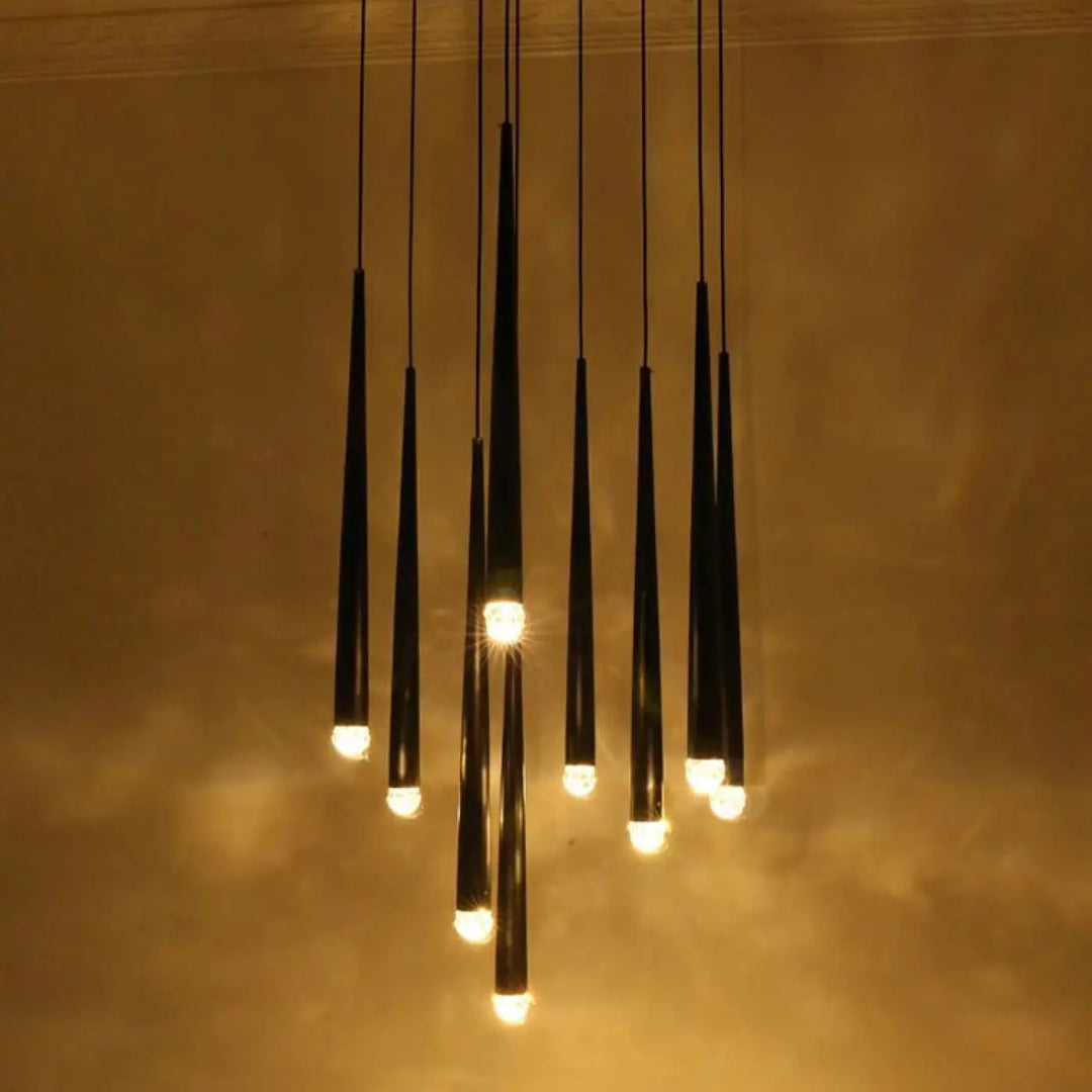 Suspension luminaire gildeo noir tapered avec h300cm et lumière chaude montrant des ampoules chaleureuses éclatantes