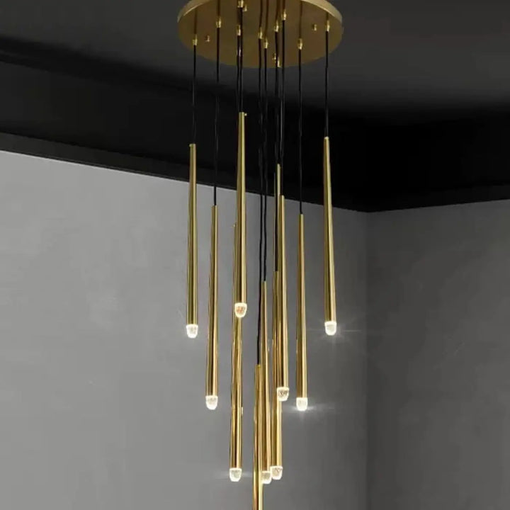 Suspension luminaire gildeo h300cm en métal doré avec tiges cylindriques fines et lumière led chaude et neutre