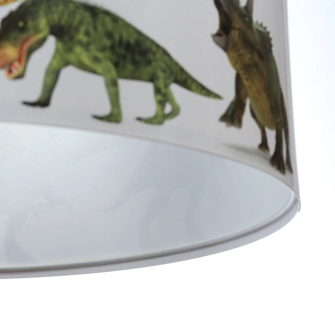 Suspension luminaire enfant avec abat-jour cylindrique blanc orné de dinosaures verts et bruns pour luminaire enfant dinosaure