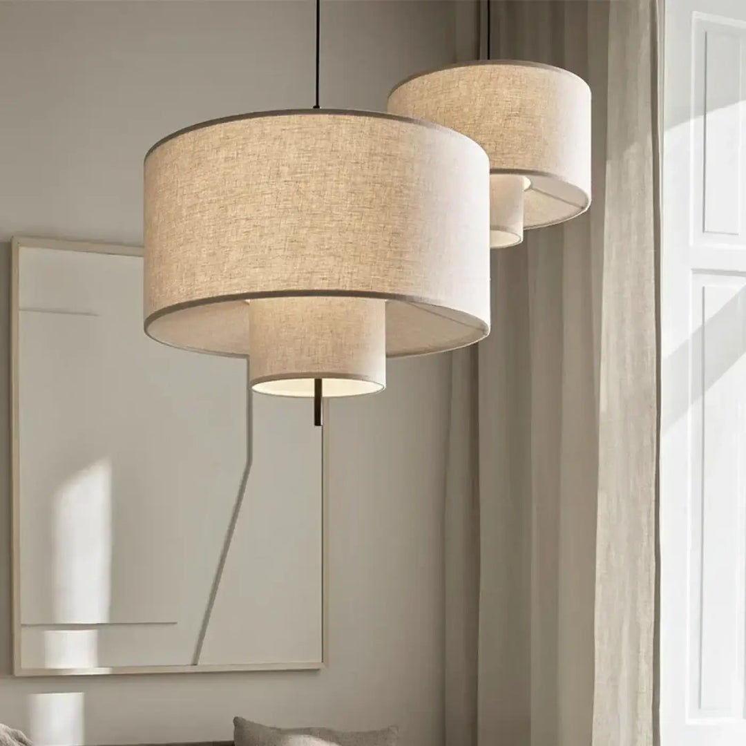 Suspension luminaire forme cylindriques au design épuré en tissu

