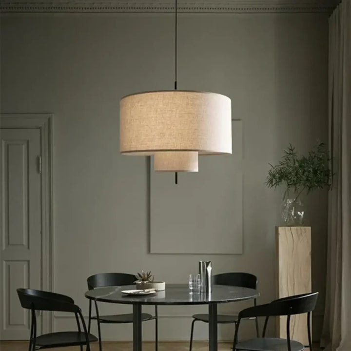 Suspension luminaire forme cylindriques au design épuré en tissu

