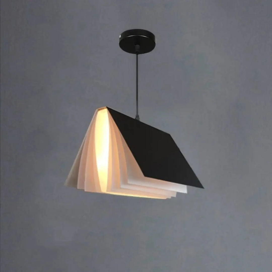 Suspension luminaire boky en forme de livre ouvert transforme noir et crème avec design minimaliste