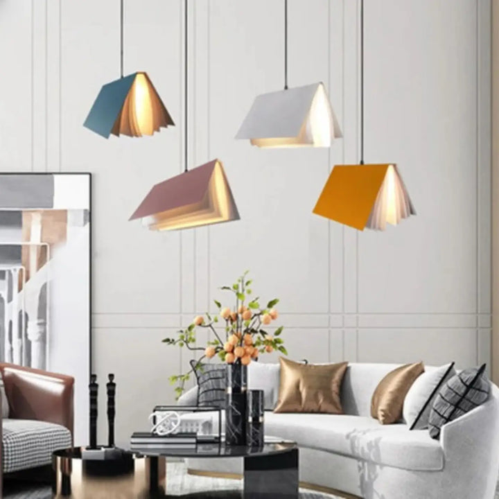 Suspension luminaire boky en forme de livre ouvert transformé avec lumière chaude en bleu blanc mauve et orange