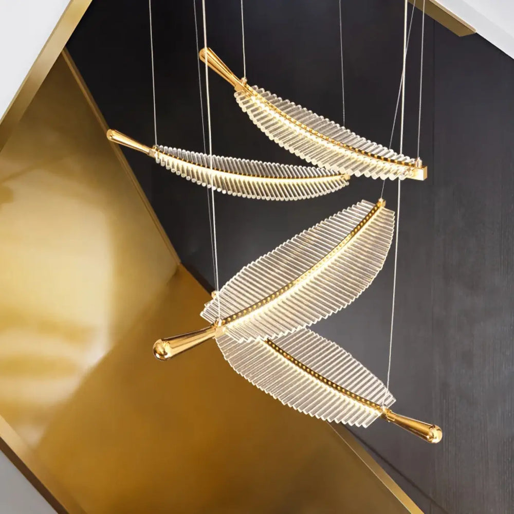 Suspension luminaire en forme de plume cristal et doré élégant