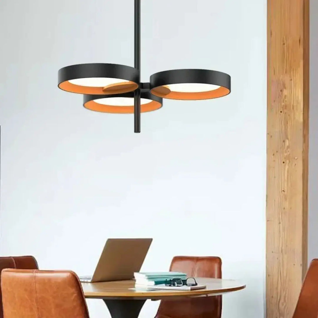 Suspension luminaire graphique kexong avec cercles lumineux noirs et orange au design minimaliste moderne
