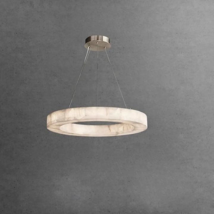 Suspension luminaire sylia avec anneau en marbre blanc poli et quincaillerie en nickel brossé ampoules sont-elles incluses