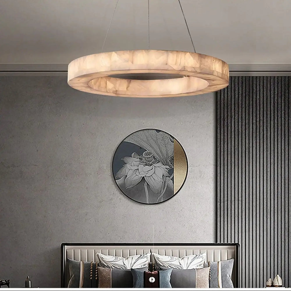 Suspension luminaire sylia avec finition translucide marbrée chaleureuse ampoules sont-elles incluses
