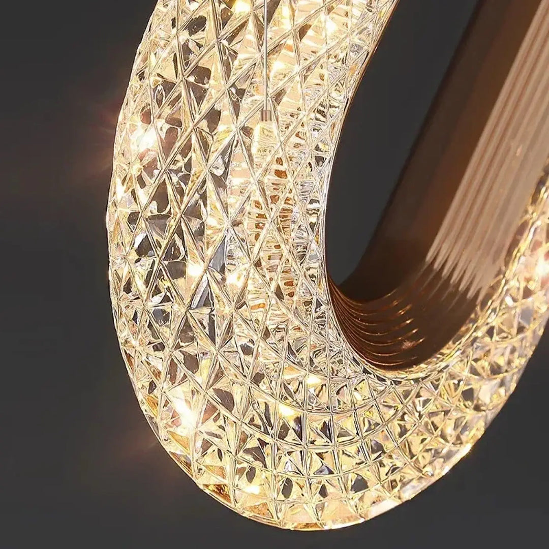 Suspension luminaire LED doré disponible en ovale ou rond

