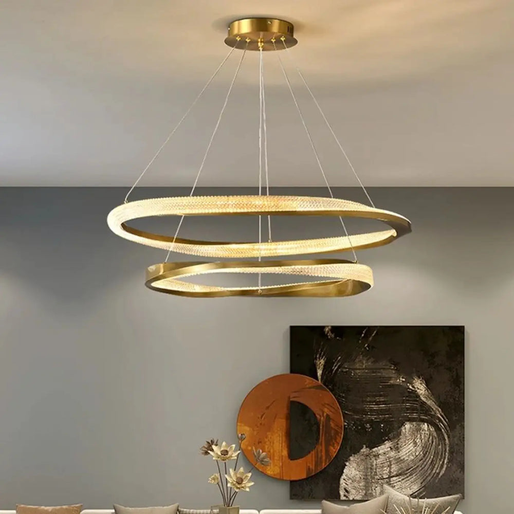 Suspension luminaire led dorée anneaux flottants élégants