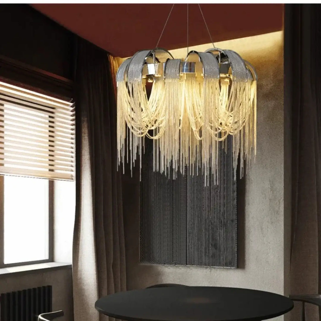 Suspension luminaire luxe avec franges en métal argenté ou doré
