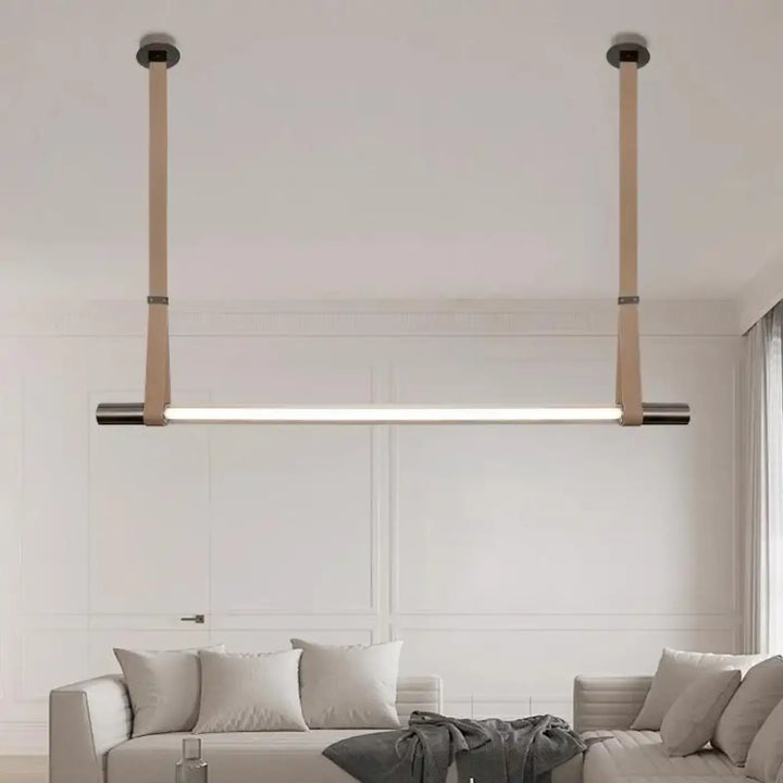 Suspension luminaire minimaliste lea avec barre led rectangulaire beige en cuir et métal foncé pour intérieur moderne