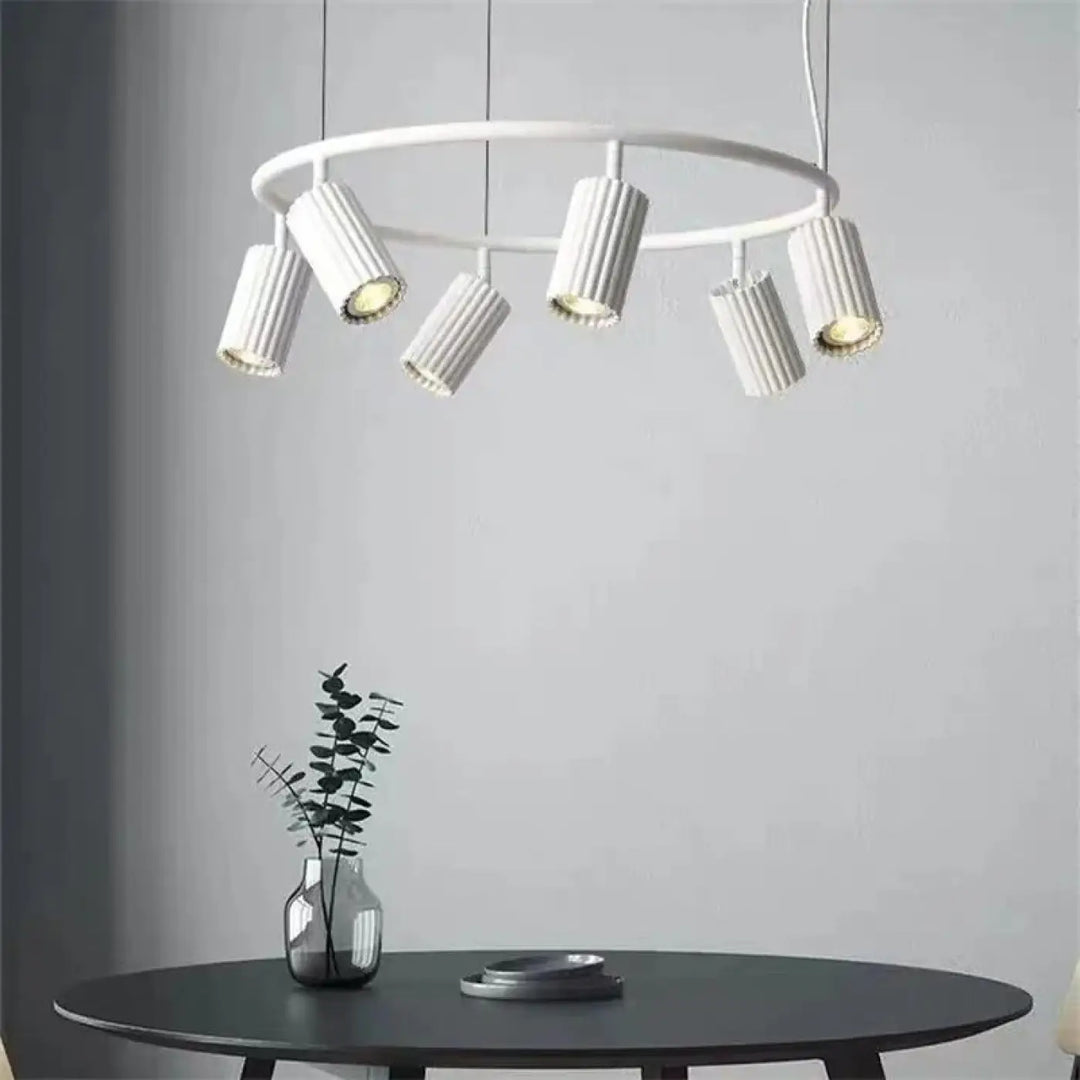 Suspension luminaire zynth blanc avec cinq cylindres texturés ronds minimaliste pour éclairage ciblé