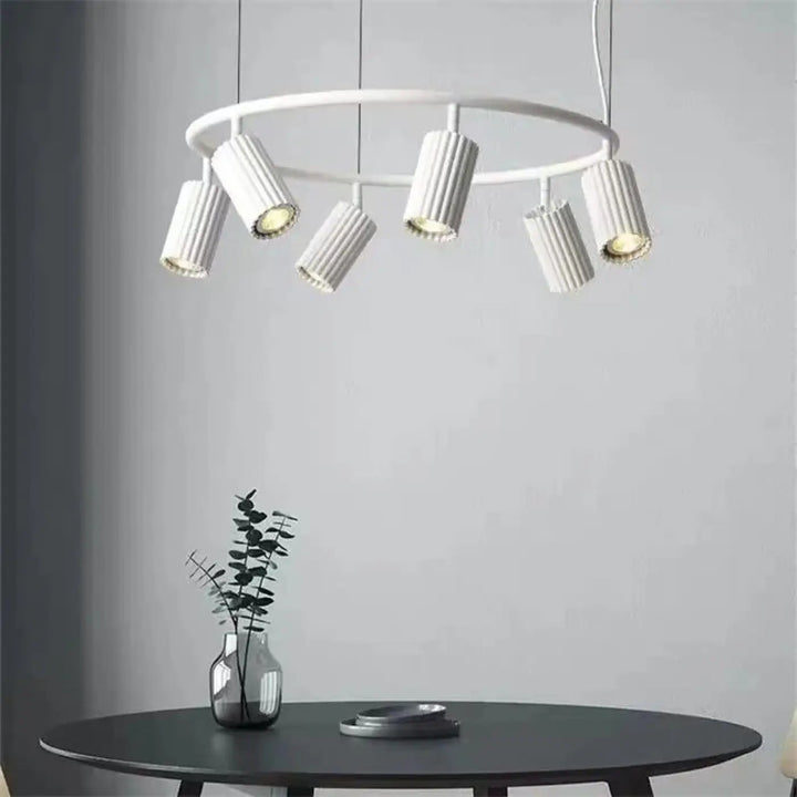 Suspension luminaire zynth blanc avec cinq cylindres texturés ronds minimaliste pour éclairage ciblé