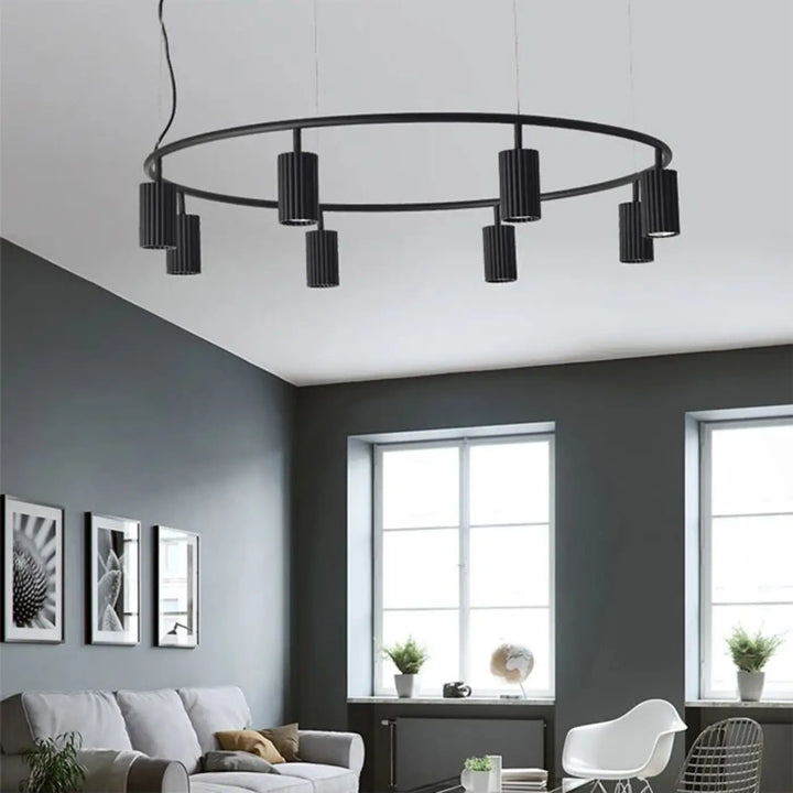 Suspension luminaire minimaliste zynth avec cylindres texturés noirs et abat-jour circulaire en suspension