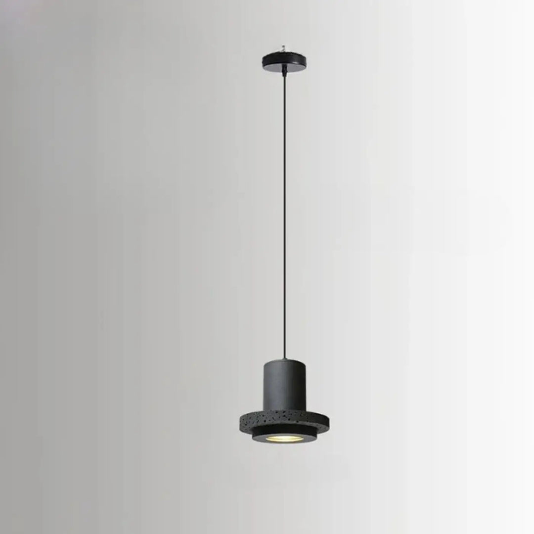 Suspension luminaire danys trou noir avec base en pierre trou noir texturée et suspension métal pour salle à manger