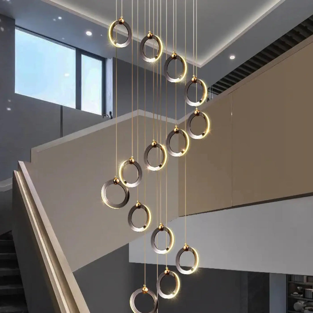 Suspension luminaire moderne anneaux led doré noir