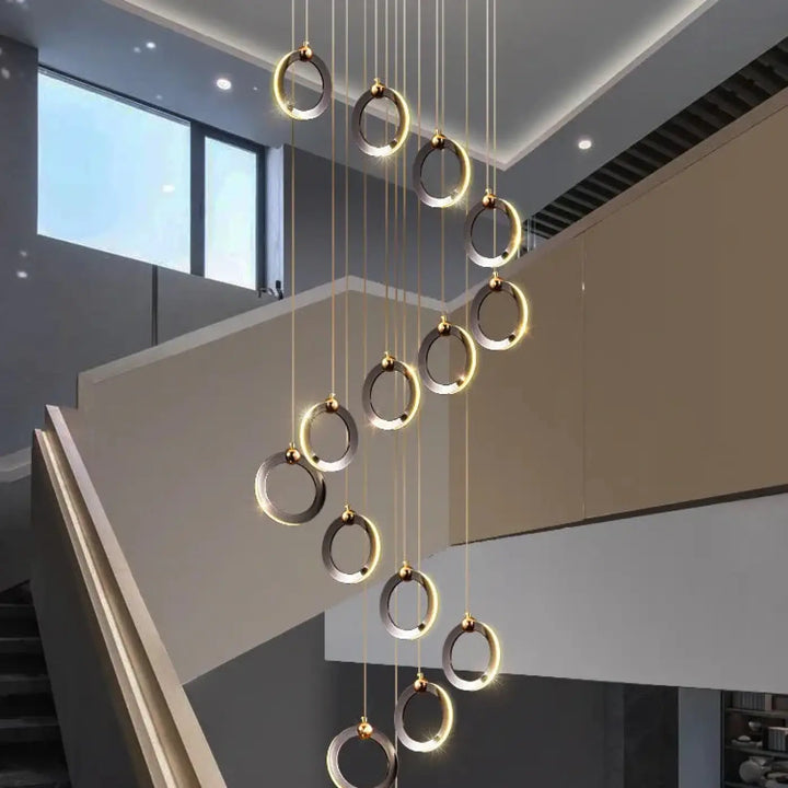 Suspension luminaire moderne anneaux led doré noir