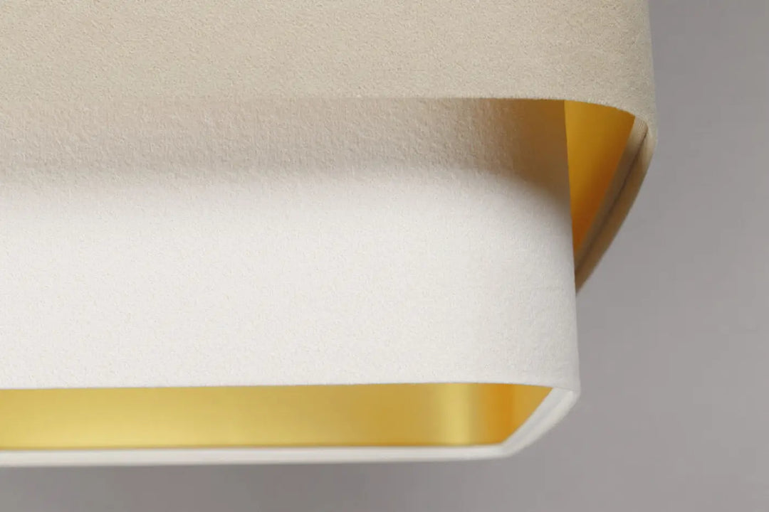 Suspension luminaire moderne kwadro duo beige avec abat-jour en tissu blanc cassé et intérieur or élégant