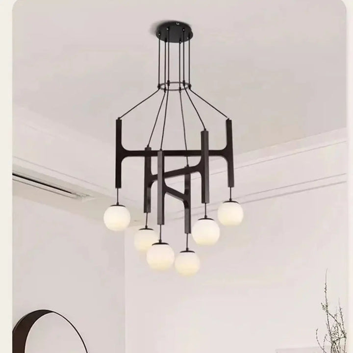 Suspension luminaire gradia en métal noir avec six globes en verre dépoli pour un besoin d’ouvrir lumineux élégant