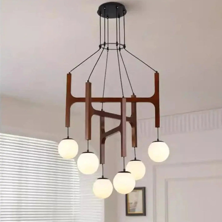Suspension luminaire gradia en bois moderne avec six globes en verre dépoli et fixation plafond métal noir ideal pour besoin d’ouvrir