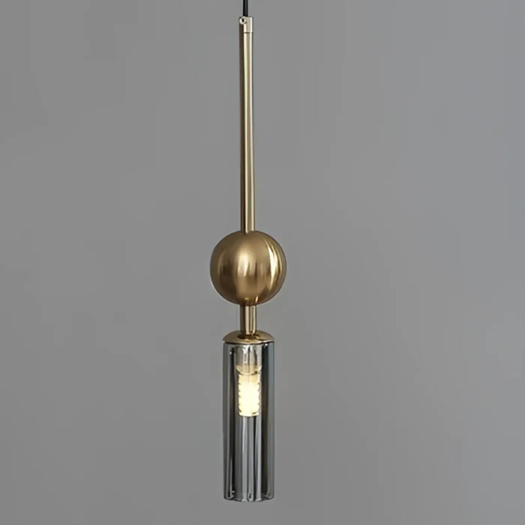 Suspension luminaire krysta avec boule métallique en laiton poli et abat-jour cylindrique en verre chrome moderne