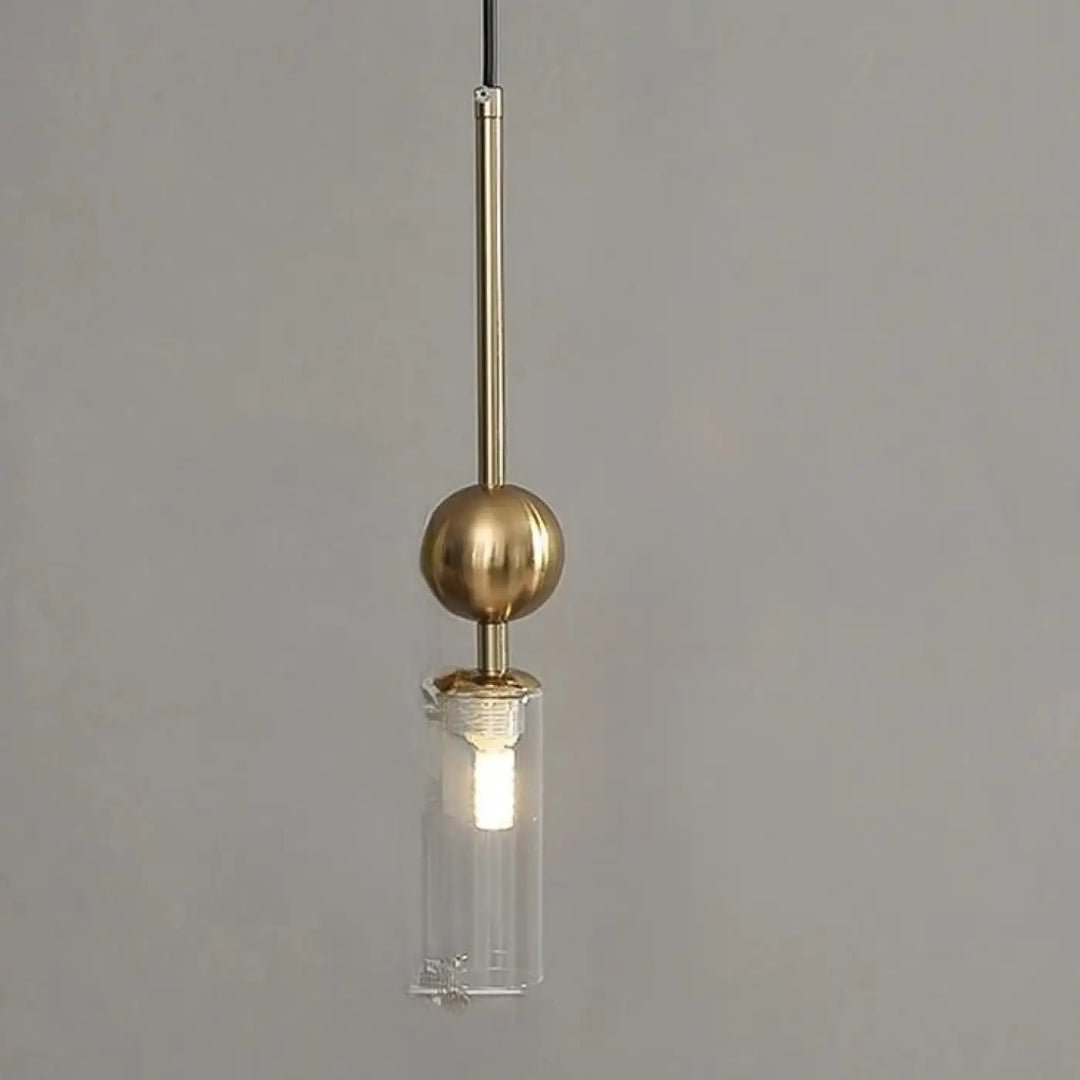 Suspension luminaire krysta avec boule métallique en laiton et cylindre en verre transparent pour éclairage moderne