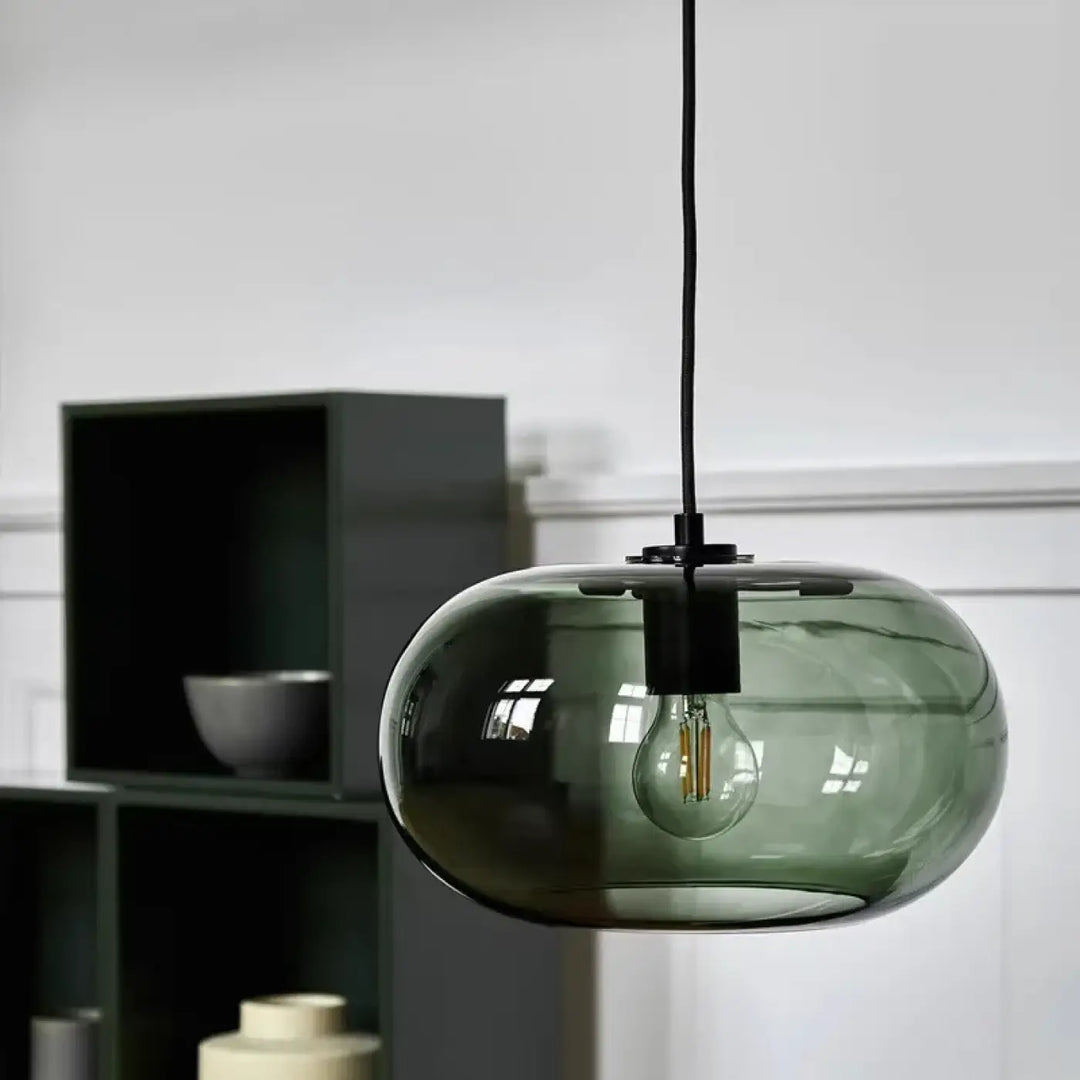 Suspension luminaire moderne en verre fumé vert foncé avec design arrondi et ampoule filament apparente sietra