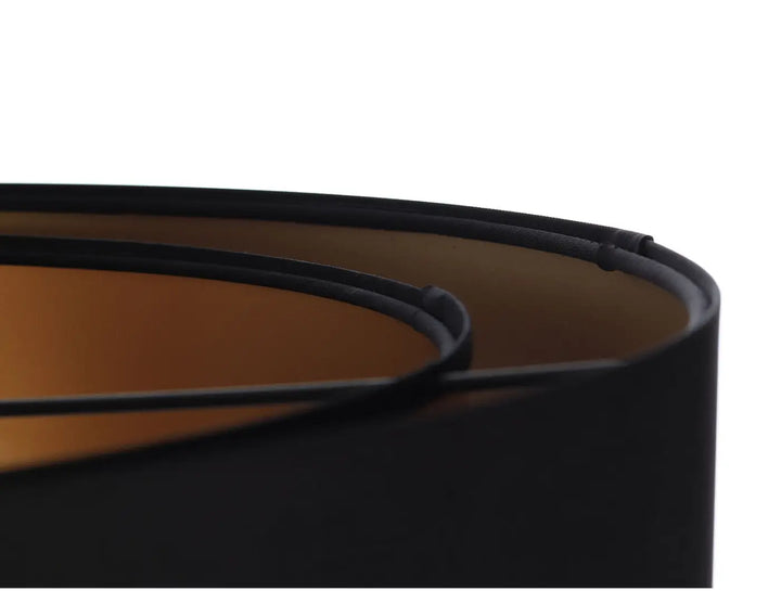 Suspension luminaire noire en tissu noir avec intérieur ambré chaleureux pour un éclairage élégant