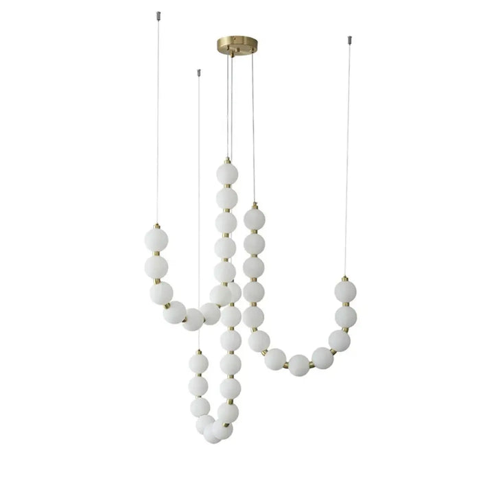 Suspension luminaire perita avec perles blanches en verre dépoli et structure en laiton pour une ambiance douce