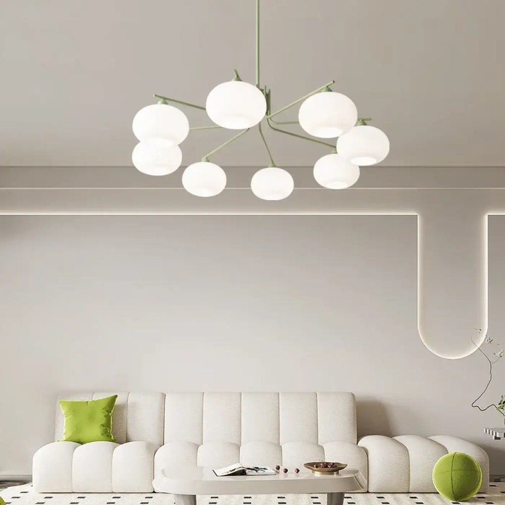 Suspension luminaire antiki vert pastel en métal avec plusieurs globes en verre dépoli pour un design raffiné