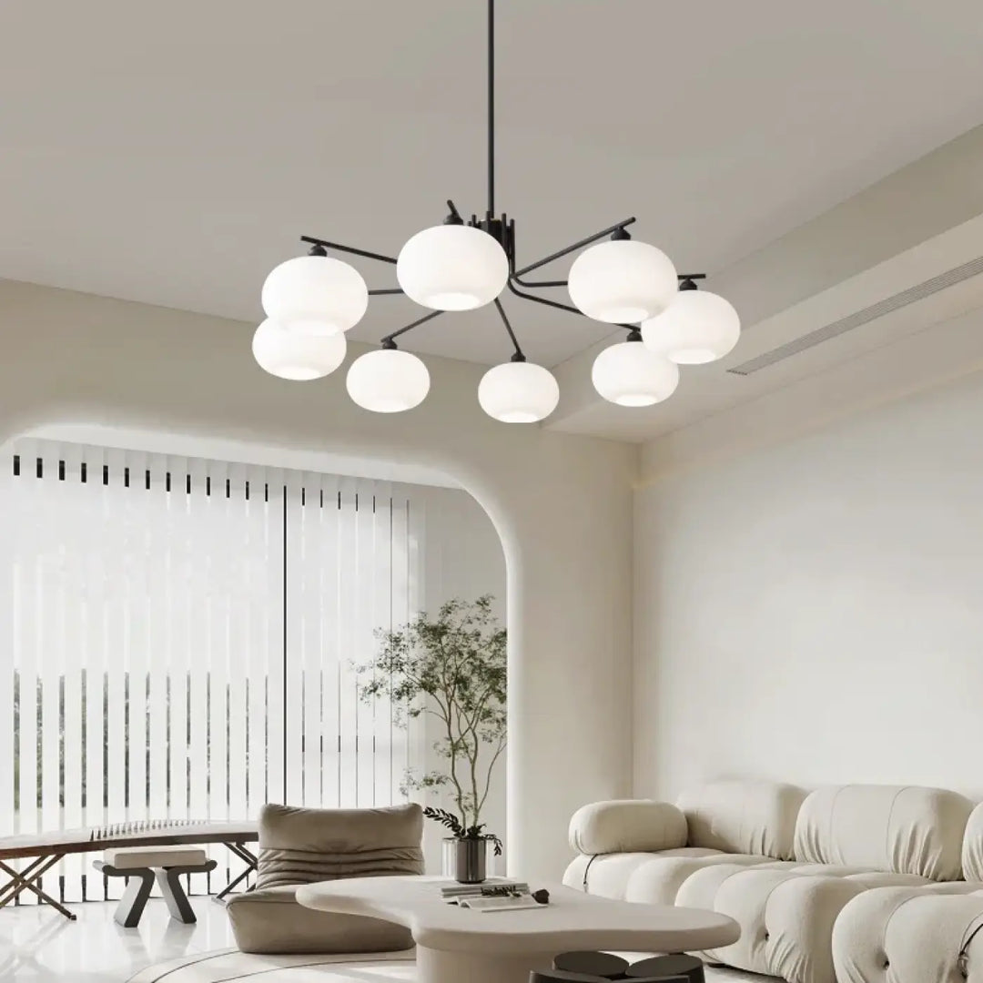 Suspension luminaire antiki en métal noir moderne avec six abat-jours sphériques en verre dépoli blanc vert pastel raffinée