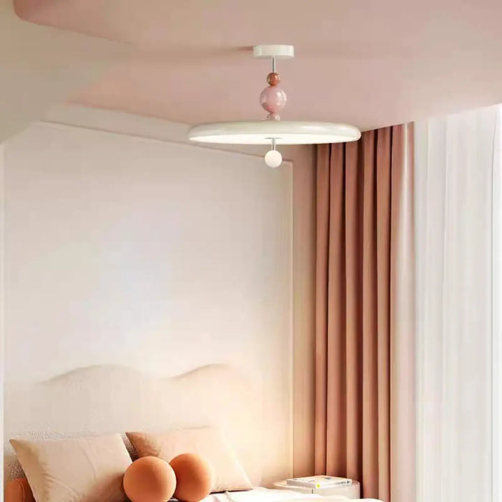 Suspension luminaire tania style contemporain en pastel rose et blanc avec éléments sphériques pour ambiance douce