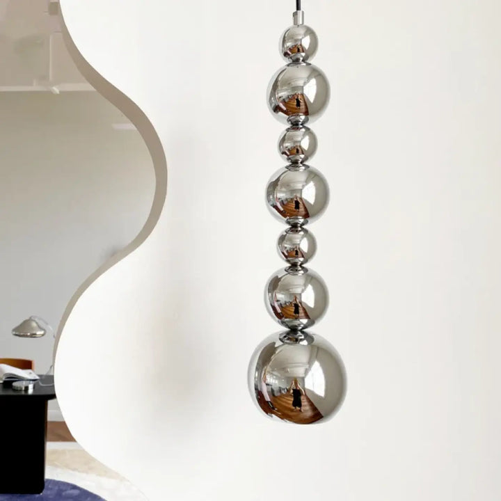 Suspension luminaire au style moderne en forme de totem vertical

