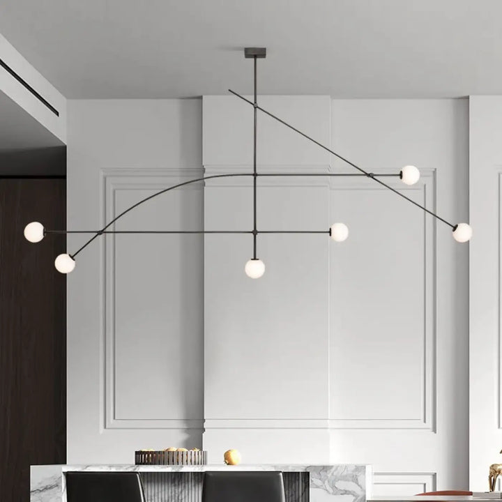 Suspension luminaire style moderne moack en métal noir avec six globes en verre blanc sphériques