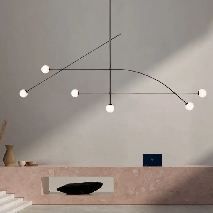 Suspension luminaire style moderne en métal noir avec six globes en verre blanc pour un éclairage contemporain