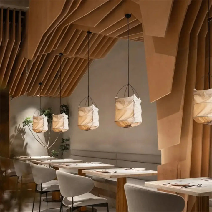 Beige suspension luminaire lima avec cordon noir et design géométrique simple style scandinave élégant