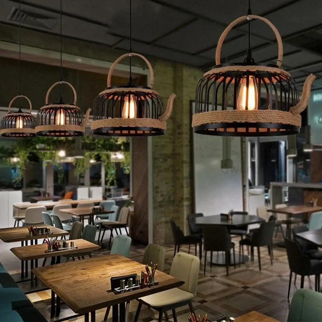 Suspension luminaire hemba en fer forgé noir avec accents en corde tressée et lumière chaude à ampoules à filament exposé pour décoration intérieure