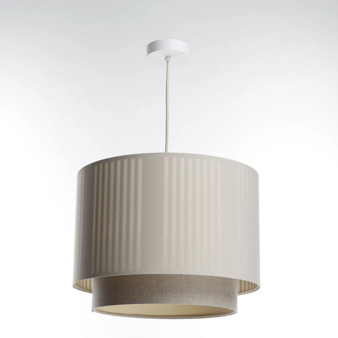 Luminaire suspension tissu beige avec lampe plissée à design cylindrique superposé style moderne chic