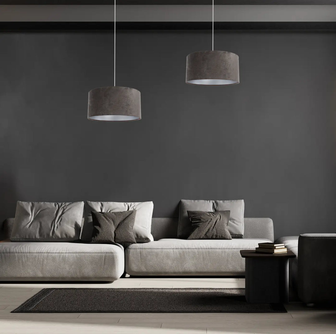 Modern gray fabric sofa with textured cushions and matching throw pillows in gris marron tissu gris marron suspension luminaire