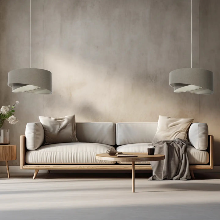 Suspension luminaire galaxy boho elegant avec tissu gris marron et canapé beige en bois avec coussins assortis