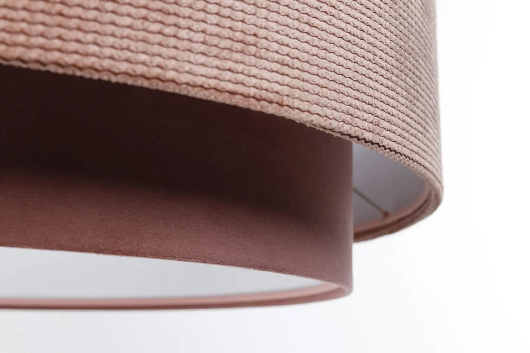 Suspension luminaire doblo classic avec abat-jour cylindrique tissu rose aux finitions blanc et texture tissée