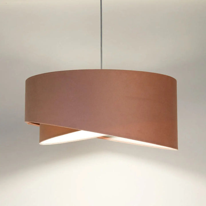 Suspension luminaire cylindrique cuivre avec design moderne et tissu vieux rose pour éclairage intérieur contemporain