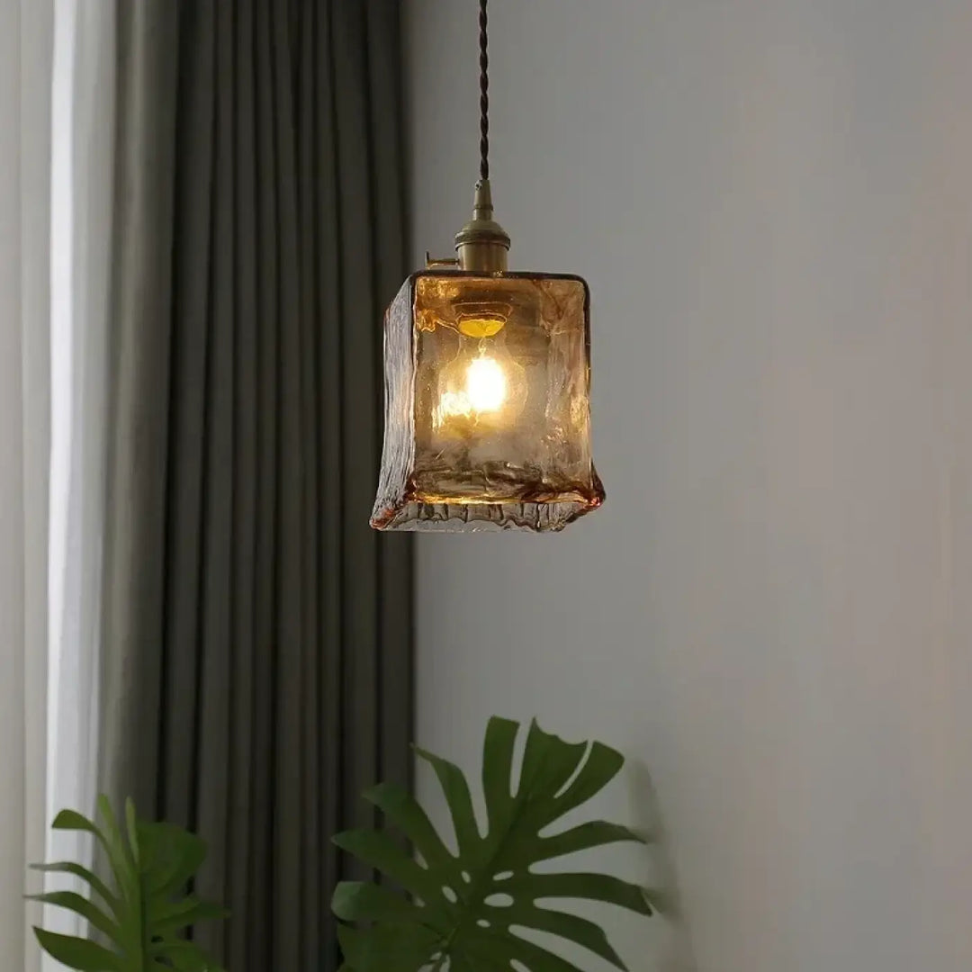 Suspension luminaire en verre ambré au design rétro chic