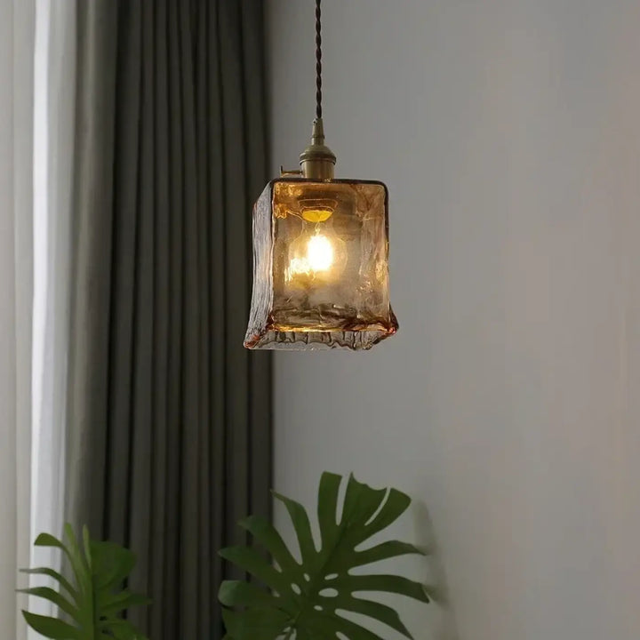 Suspension luminaire en verre ambré au design rétro chic