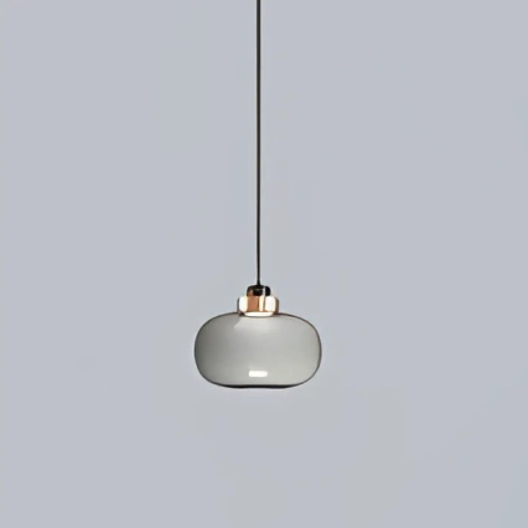 Suspension luminaire mistral avec globe en verre gris fumé et structure métallique cuivrée minimaliste