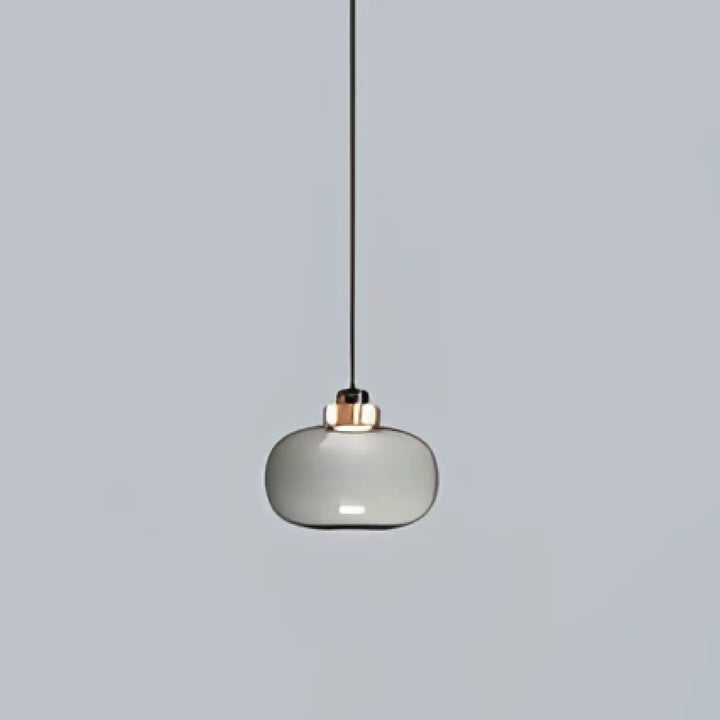 Suspension luminaire mistral avec globe en verre gris fumé et structure métallique cuivrée minimaliste
